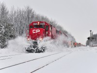 By a beautiful winter day, CP 143 is plowing some snow on the Winchester Sub.
