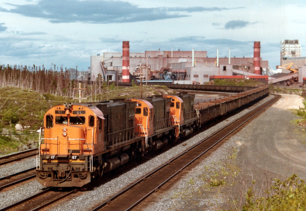 Cartier Rwy M636 87 leads sisters 75 and 76 northward with a train of empties from the Iron Ore processing Plant at Port Cartier. Loads are picked up at Mont-Wright in the north to be brought down to Cartier where the processed product is shipped out from the St. Lawrence River port.