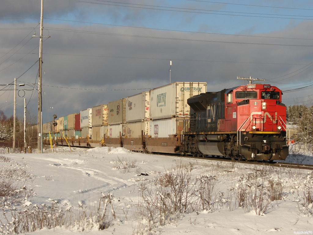 With a fresh Capreol crew on board, and their roll by now complete CN 112 is starting to throttle up knocking down a clear signal at the South end of Suez.