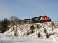 CN A45131 01 - GTW 5931 North highballing out of Gravenhurst with a short 29 car train for North Bay, kicking up some fresh powder from the night before. 