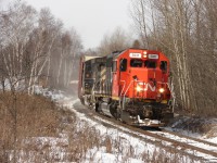 CN A45131 01 - GTW 5931 North slowly making their way through the curves into Huntsville, with no work and a short 29 car train on a beautiful winter morning. 
