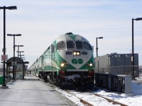 An eastbound GO train, with MPI MP40PH-3C's 646 and 620 leading, pulls into its destination, Oshawa station.