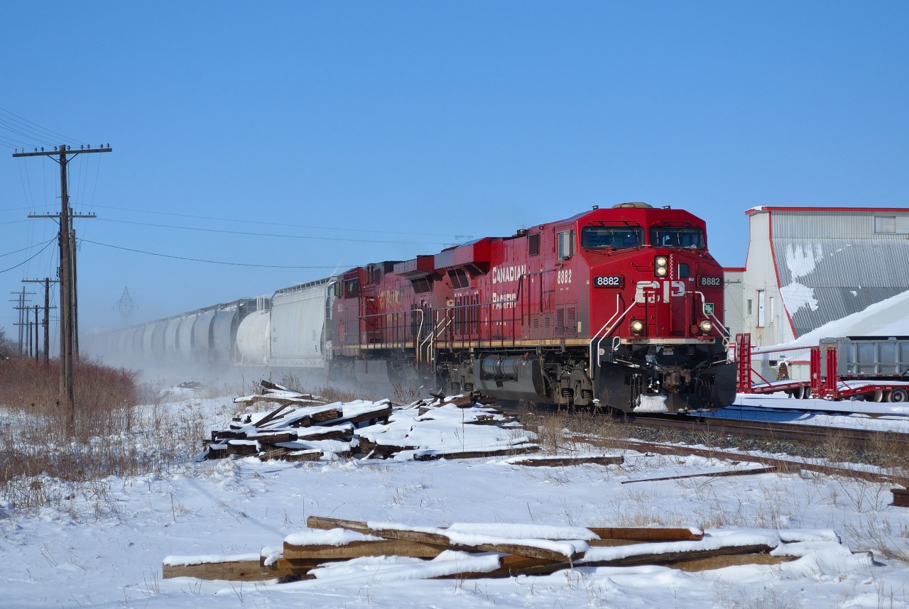 CP 254 kicks up the fresh snow as it passes eastbound thru Tilbury.