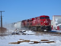 CP 254 kicks up the fresh snow as it passes eastbound thru Tilbury.