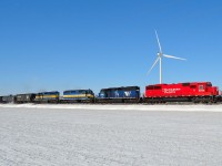 CP 642 led by rebuild 6234 (ex SOO 6034) and a colorful all EMD consist, heads eastbound thru Haycroft mile on this mild winter day.