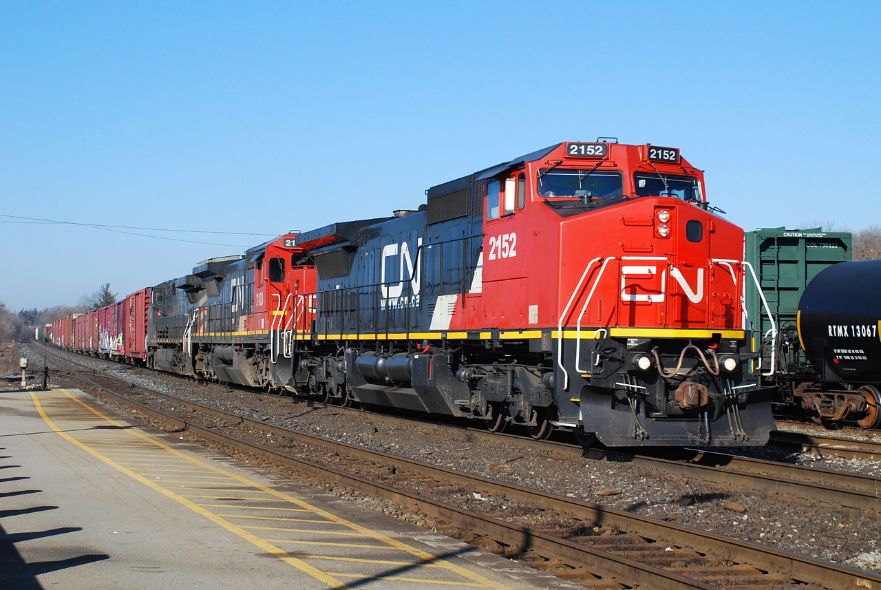 Former ATSF, CNW and BCOL GE's make a fine sight as they approach the station in Brantford on a beautiful winter morning.