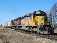 GEXR 581 finally departs Clinton after a lengthy stop to get HLCX 6522 restarted. Why a single SD40-2 couldn't handle the 13 car train is beyond me.  