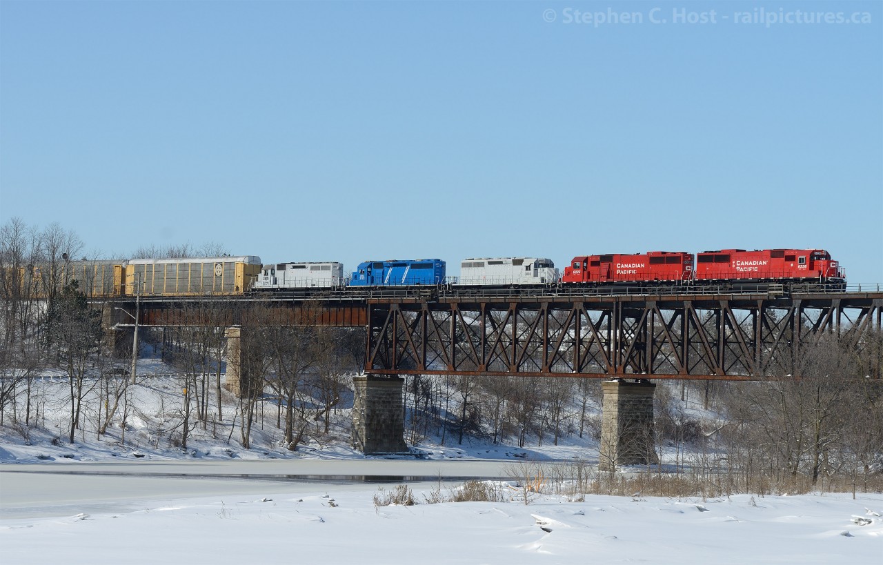 CP 282-07 crosses the Galt Bridge with a few leasers and a pair of rebuild SD60's (ex SOO) on the head end.