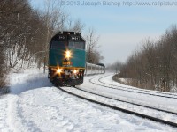 Via 73 with locomotive number 6401 on the point negotiates its way through Dundas Ontario on the North Track on the CN Dundas Subdivision