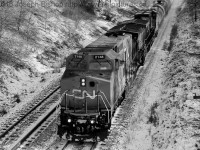 CN 2148 rushes a short CN 331 through Copetown Ontario on a chilly morning.  CN 2148 was my first ex BNSF unit that I caught.  Note it also has the split cooling modification at the rear of the locomotive.  This is my 100th photo on Railpictures.ca