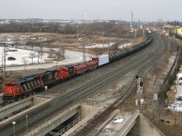 CN 435 makes an unusual appearence in Oakville with CN 5519, CN 2184 and CN 7080 providing the power.  This shot was taken from the top level of the new GO Transit parking garage.  Thanks David for the heads up!