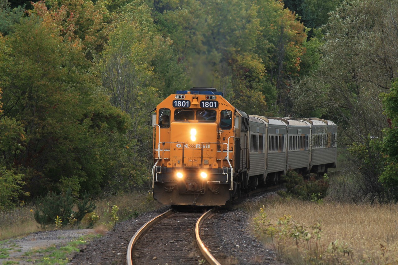 One of the last runs of the Northlander. ONR 395 "Northlander" lead by GP 38-2 1801 carrying a DPU, three coaches and a dinning car, approaches Bracebridge. awaiting the Northlander is a platform full of Train fans and photographers. Once passengers have boarded, it will continue on its way to Toronto. 2 days later, the Northlander will be nothing but Canadian rail history.