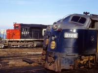 N&W 3726 and 3725 with CN 5057 await assignment at the CN Boat Yard engine facility in Windsor January 7, 1975.