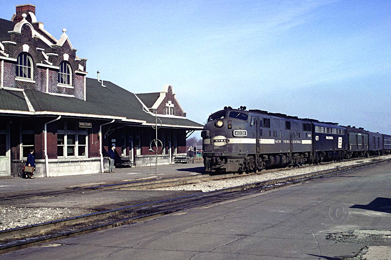 In the days preceding the arrival of Amtrak, NYC 4031 and PC 4271 lead Detroit to New York City train 50, The New York Special, to a station stop at the Penn Central station in Windsor April 12, 1970.