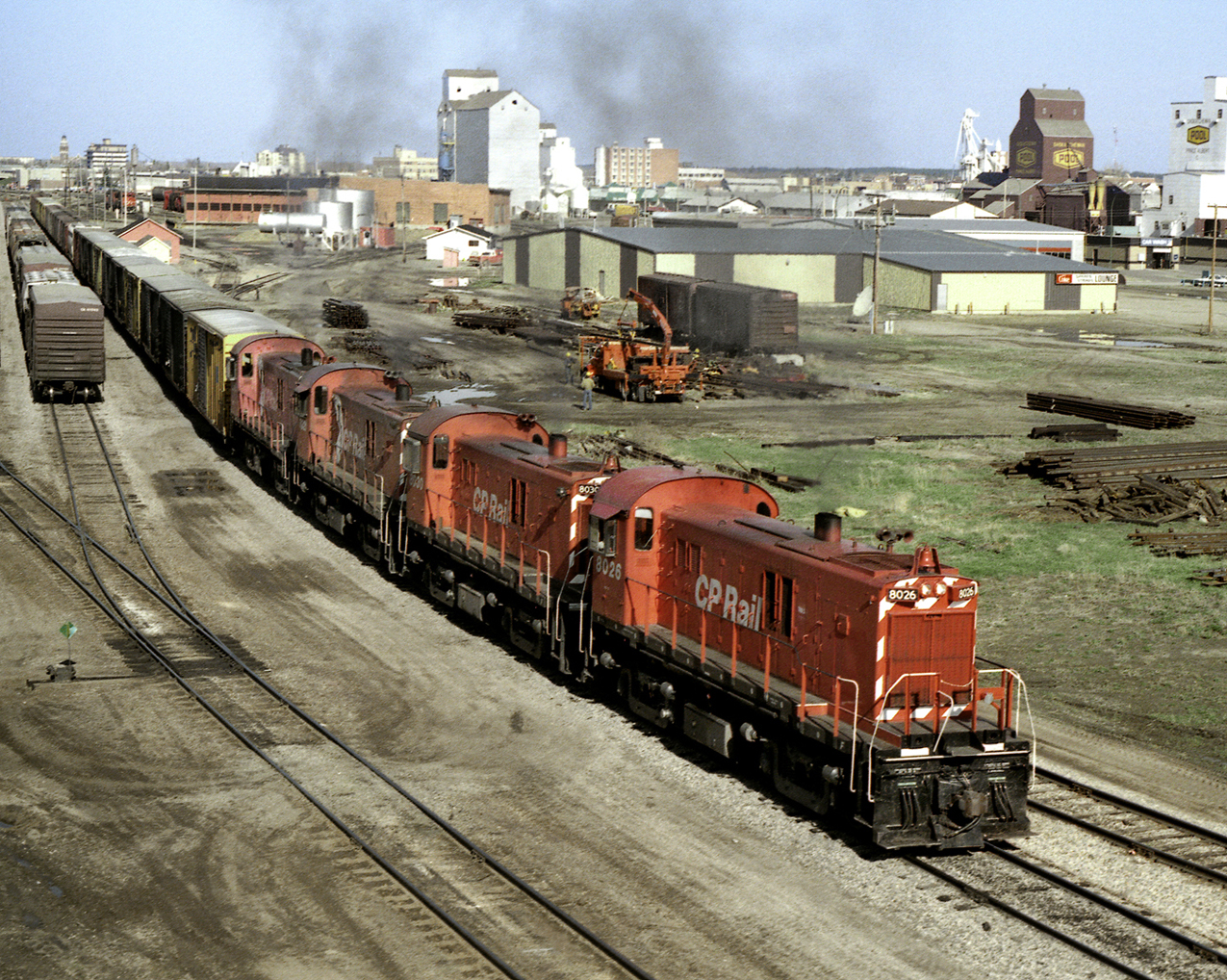 CP Lanigan wayfreight with 4 RS23 units makes a double over in the CN yard before heading east on the CN to Northway Junction where it will run south to a connection with the North Main at Lanigan.