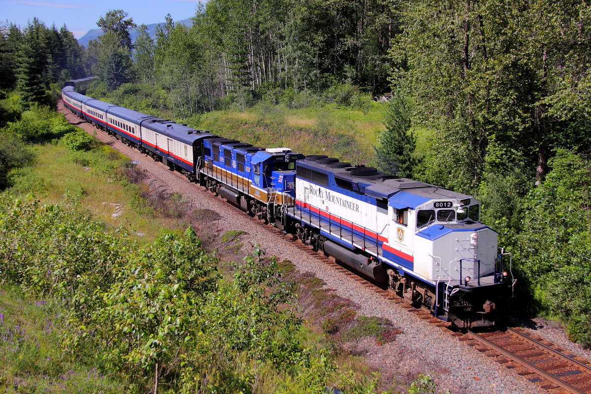 The eastbound Rocky Mountaineer is about to duck under the Trans-Canada Hwy at Craigellachie.