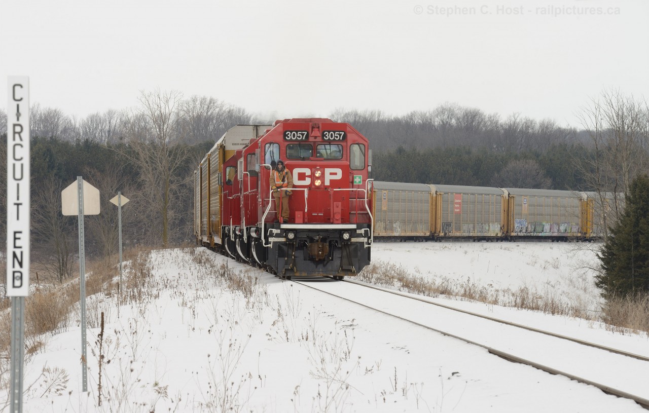 TK22 has worked west to Woodstock and is not yet clear of the Galt Sub mainline Toyota Spur Switch Pender  - with  recently re-painted (Thankfully) 3057 in the lead. This spur and yard were constructed in 2008 for the new assembly plant and re-used some of the former Galt sub alignment (bridge over the river). Around 1960 a dam was constructed, creating a man made lake and the enlargement of the riverbank caused the Galt sub to be re-aligned between here and the Station. If you look on the Google map below - you can make out some of the ROW. Bonus: Can you find the ex CNR Hickson Sub right of way? (Ran to Tavistock - a small segment still exists but is now disconnected from the CPR just east of the Station)