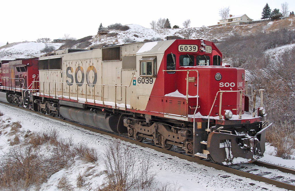 While it may look like this SOO SD60 is leading a train, it's actually part of a consist returning from the wye about 2 miles west of where this picture was taken onto the Cousins spur. CP took this consist 3 miles and back from Medicine Hat yard to the Cousins spur wye just so the SOO unit wouldn't have to lead a train West.