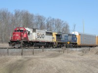 During a study break from preparing for my final exams before graduation, a nice warm spring day finds me at the CP Galt Sub in hopes of catching a train or two. When I heard SOO 6031 West switching the yard at Wolverton I wasted no time to get to this spot. Here we see SOO 6031 and CSXT 332 departing the West Begin/End CTC Sign Wolverton (WOL) after completing their work.