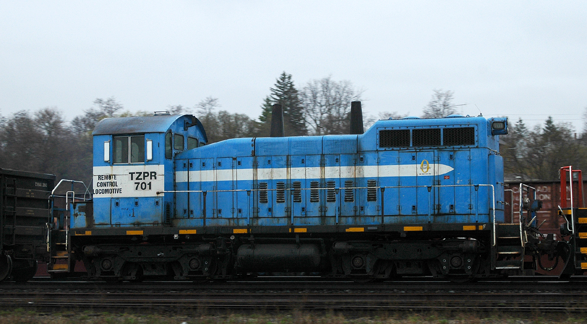 TZPR trails on CN 330 on a dark and rainy March afternoon, on it' way to Brookville, PA for an overhaul.
Click the link below to see what it should look like once rebuilt