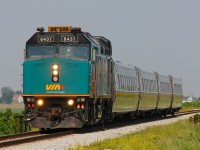 Rebuilt F40PH-2d #6437 still shows a sign of it's former livery as it approaches Pump Road just West of Prairie Siding.