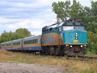 Rebuilt F40PH-2d #6442 approaches the scene where train 74 had it's fatal wreck over a decade ago; horn sounding for the next crossing ahead.