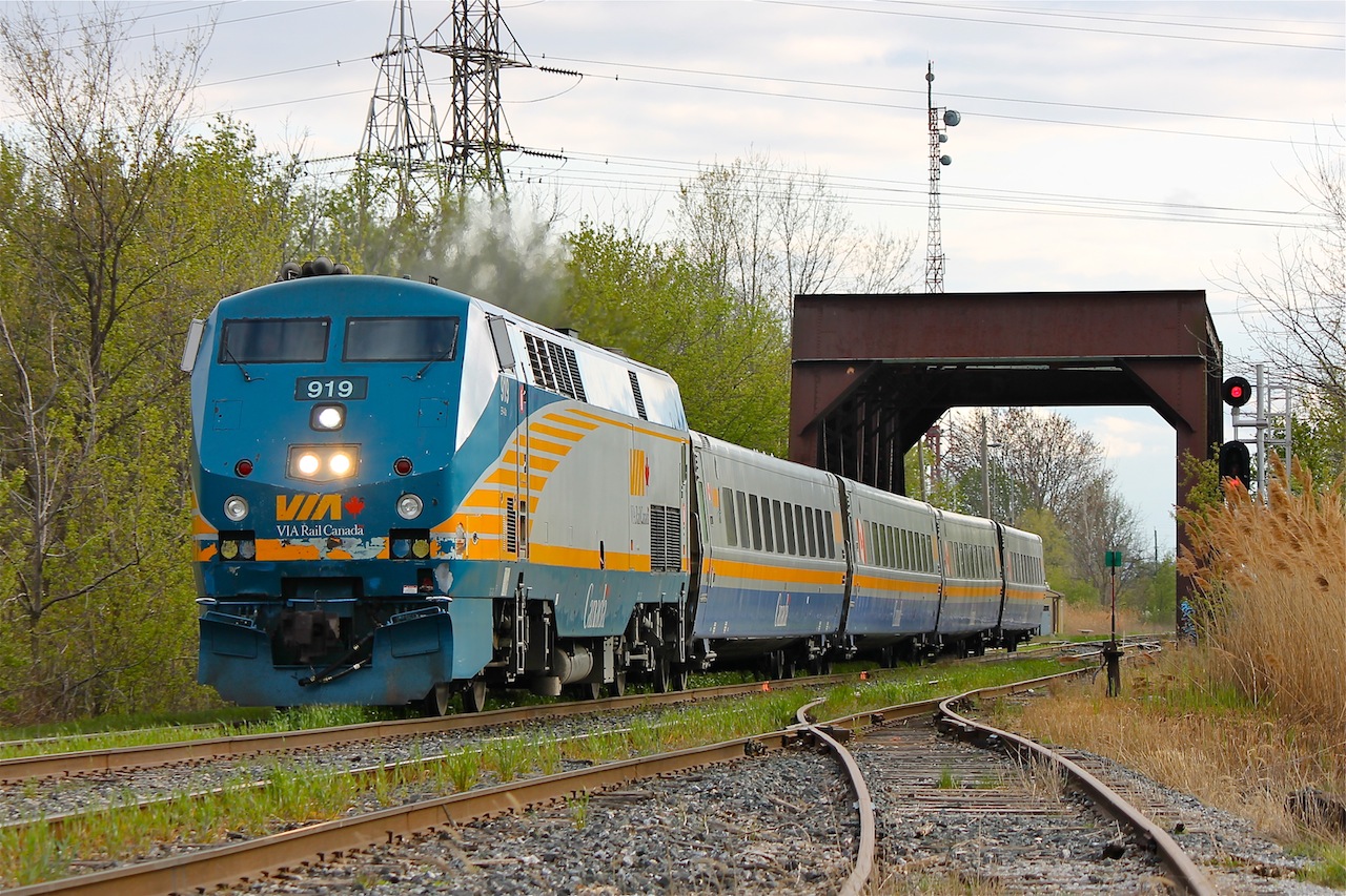 VIA 78 powers down the South track of the CN Chatham Sub on it's westbound voyage to Toronto. 919 and it's LRC consist are crossing McGregor's Creek at Chatham East.