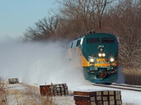 A tie replacement program is evident on the VIA portion of the Chatham Sub as Toronto bound VIA 903, with train 72, kicks up the snow at Puce Ontario.