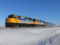 VIA's 693 Winnipeg to Churchill train heads out across the frozen prairie just west of Winnipeg.