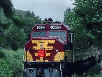 Ex Santa Fe FP45 #91 and other WC units are descending the 3.94% grade to the Harbour for another cut of limestone.