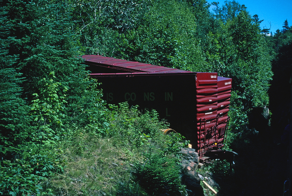 In the Bush!! I am not sure what happened here as this was after I had left the ACR. There are not two cars here, but rather this is the same car cut or broken in half and the halves were lined up side by each.