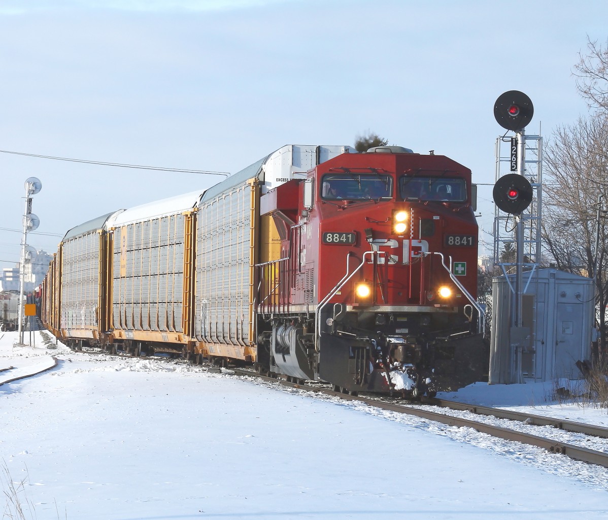 CP train 204 is diverging into the single track Nipigon subdivision at Current River. Remnants of the track to CN's Kinghorn subdivision can be seen to the left. The connecting switch was removed by CP in the fall of 2012 and new signal masts facing both directions were installed at the same time.