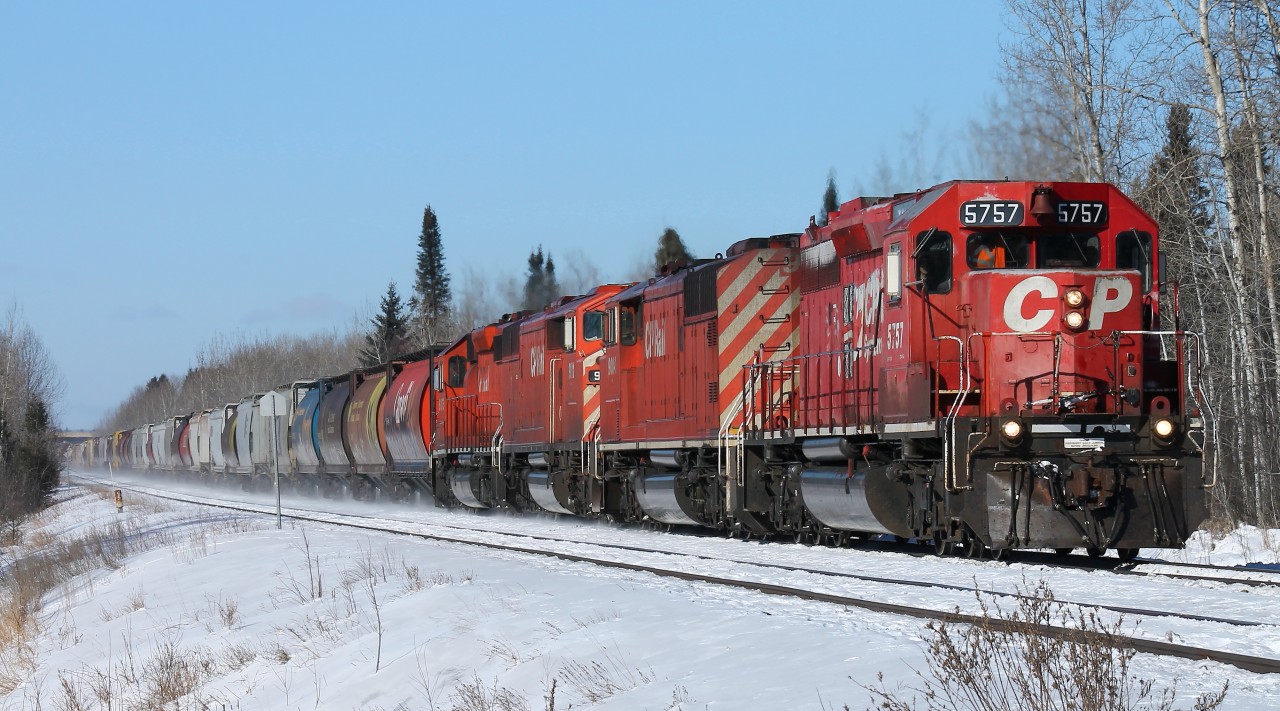 Train 306 is carded as a unit train with 112 export grain hoppers destined for Trois Rivieres, PQ. This consist of SD40-2 5757, SD40-2F's 9004, 9011 and SD40-2 6072 - will be taken off in Thunder Bay and replaced with an all GE headend for the eastward trip.