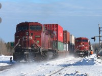 At the west switch Martin, the rear remote on cp train 100 whizzes by westbound cp 8708 in the siding. 