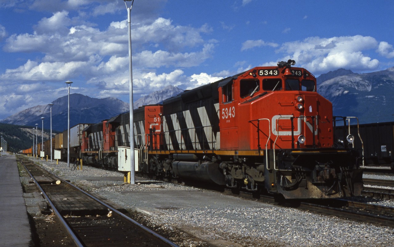 Westbound freight pausing at Jasper AB, GMD-SD-40-2W leading