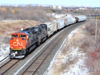 Westbound 8938 – IC 6016 are highballing on the sharp curve exiting Bowmanville mile 292. See next image – same curve thirty one years earlier - with three MLW FP-4's !

March 5, 2013 image by S.Danko.