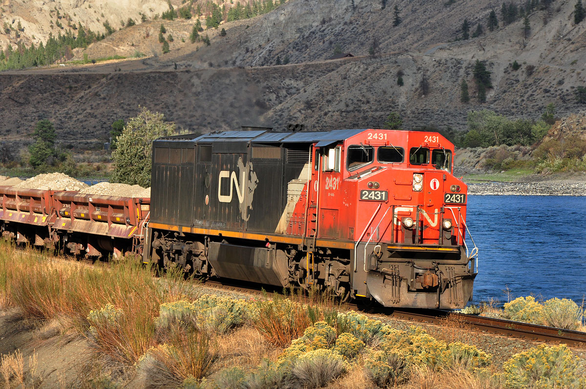 To clear the track for other Trains, CN 2341 pushs her MoW-Train to a siding east of Spenves Bridge