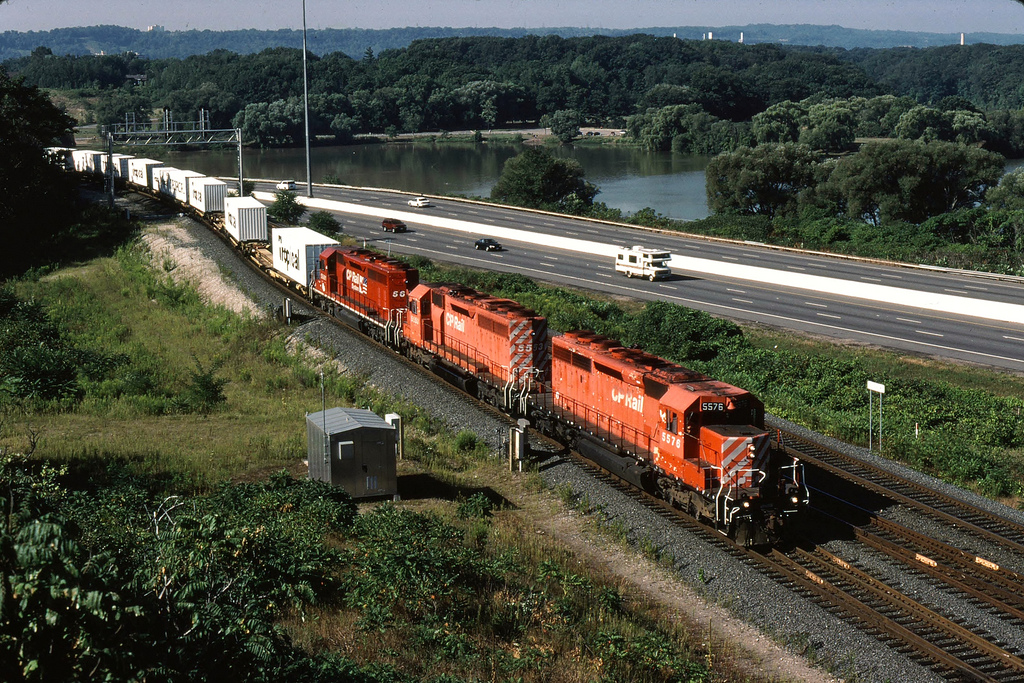 CP 5576 leads SD40 5553 and CPRS 5661 through Desjardins on CP's Hamilton Subdivision on a warm August morning in 1998 with train 557.