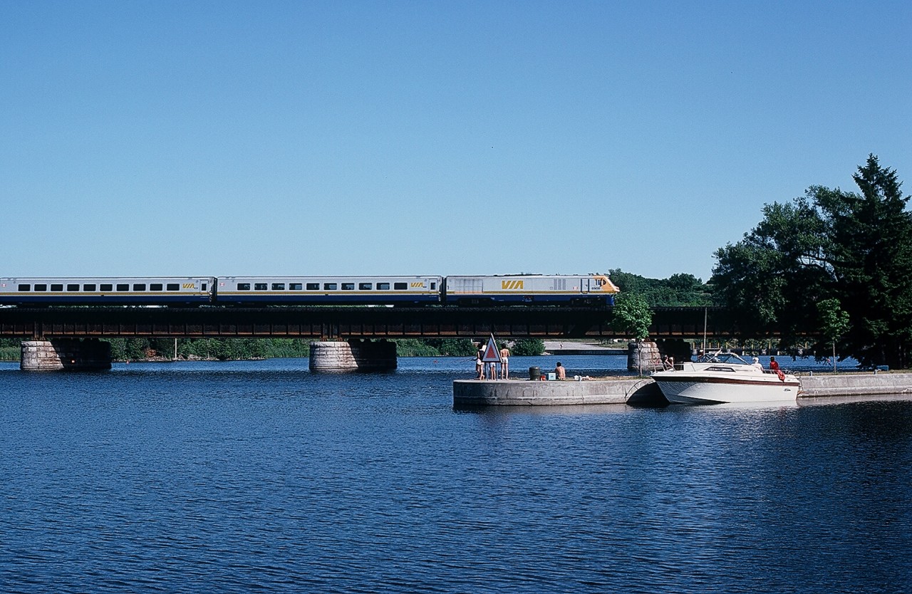 Trains and Bridges, 

 Hard to describe this as vintage, maybe classic,  the short lived - less than 20 years -  VIA LRC power with 6909,  train #65 with LRC coaches at Trenton. July 9, 1983 Kodachrome by S.Danko.

 More trains and bridges:

 Classic Train on Bridge  


 Real Classic train under Bridge  


 pan shot on bridge!