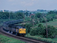 Speedy first generation MLW's:, not very often will a diesel action shot provide a sense of speed: At eighty miles per hour the centrifugal force is sufficent to slosh water out of the overflow pipes on all three units as FPA4 6787 heels to starboard on the sharp left high speed curve exiting Bowmanville mile 292.! <br><br>With the sense of speed portrayed - this shot ranks right up there in my top ten favourites ! <br><br>June 26, 1982 Kodachrome by S.Danko.<br><br>Same curve thirty one years later:<br><br> <a href="http://www.railpictures.ca/?attachment_id=8806"> 8938 west with IC 6016 </a> 