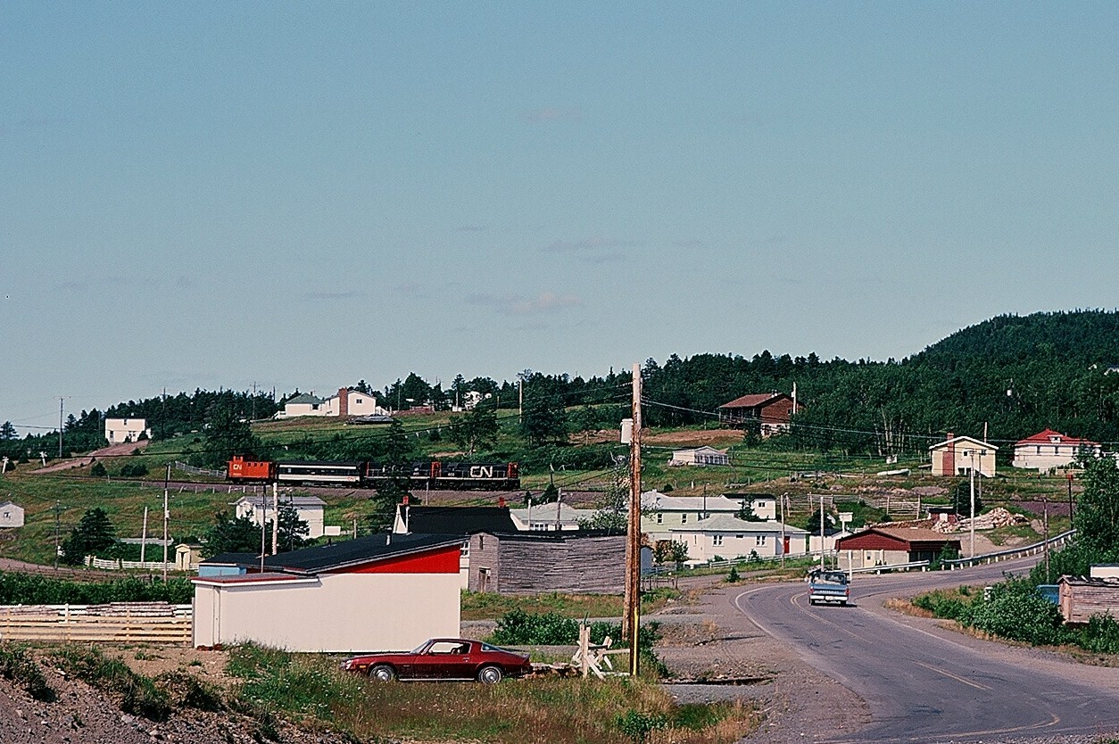 ... A special place – The Rock ... GMD G8's #802-801 (with Caboose #6061) power Wednesday only Bonavista to Clarenville Terra Transport train #205 rolling through Princeton, The Rock. ... no other place like it ... August 4, 1982 Kodachrome by S.Danko.
... More Terra Transport:

  T T #232, Clarke's Beach  

    T T #206, Lockston  

    T T power for #204, Port-aux-Basques  

 T T #205, Lethbridge  

 T T #231, Carbonear  

sdfourty.