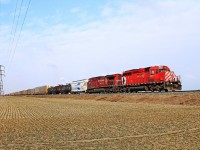 Approaching Haycroft, Multi-Marked CP 6054 with CP 8634 power train 240 eastward across the Essex County prairie at mile 87.9 on the CP's Windsor Sub.