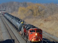 CN 8861 and sister lead a freight under the Lemonville Road bridge in Aldershot ON.
