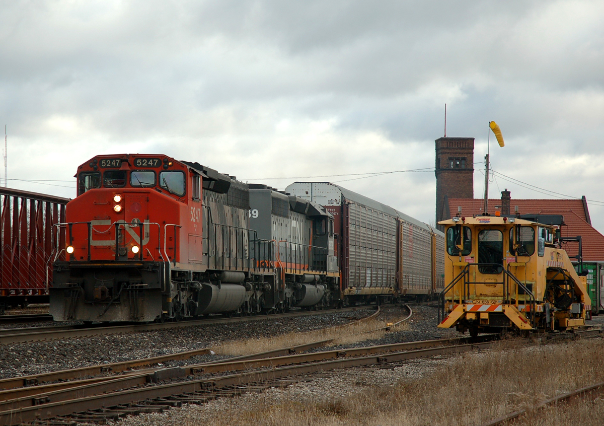 CN 279 is Westbound at Brantford with CN 5247 - WC 6939 and 84 cars on this late december morning