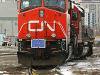 CN 2242 and SD 40-2 5379 sit between the blue-flags on the RIP track in London. Ironically, the previous day I saw CN 23** and 5373 going east through Snake, naturally I mistook them for the same consist. On a side note, I was on the eastbound Via when they passed us at Snake, we waited aprox. 5 minutes for the eastbound to clear the South track as the North was occupied by a stalled train and the train pushing it up the Dundas hill.