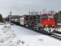 Getting underway from lengthy stop after their train went into emergency, X371 hits the plant at Grafton and gets a roll-by from the Trainmaster. With X371 dead on the North Track and a broken rail on the South, a nuber of trains took a delay here making for a nice, easy foam. CN 2559 and 2155. 1406hrs.