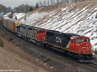 I couldn't help but think of the old 275 when I saw this 371 at Whitby, drilling the Oshawa Yard on the South Service. Having a some time before I had to be someplace, I decided to get ahead of them and grab a shot at Beare, a location I shot more than a few 275's in the latter part of the 90's. Even the power fit 275's mold; three units, all GM's, and yes, back then the GP40-2L was overly common in trio's, but on this day, I'm not complaining. No toasters = good foam. CN 5797, 9584, and GTW 5946 do the honours. 1533hrs.