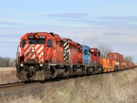 CP 5910 with CP 6050, NREX 7370 and SOO 6043 charge westward with train 241 at mile 98.88 on the CP's Windsor Sub.