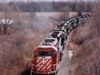 It was just over 16 years ago CP took on more leasers, this time a herd of old NS SD-40s. Here's a slew of them on the way up to Guelph Jct., as seen from the overpass at Old York Rd just south of Waterdown. In this consist are CP 6045, NS 3193, 3176, 3194, 3173, 1607, 1600, 1606, 1585 and 3170. Mount Hamilton is in the misty background.
