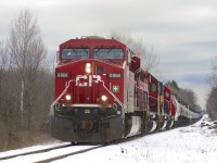 CP 641 snakes along the slight grade at Flamborough with a train of empty ethanol cars for the US Midwest. 